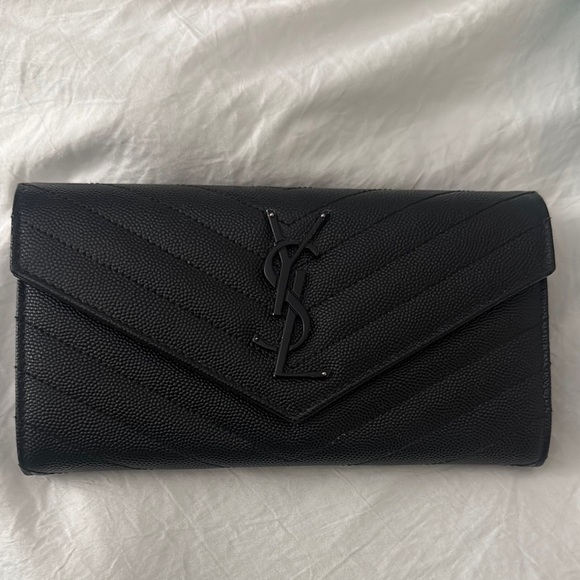 Yves Saint Laurent Handbags - Yves Saint Laurent Black Leather Clutch